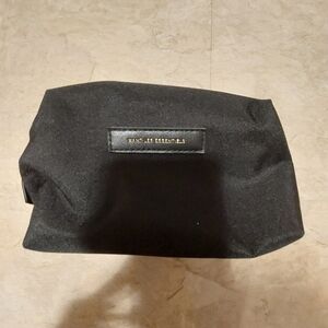 Want less  essential make up bag